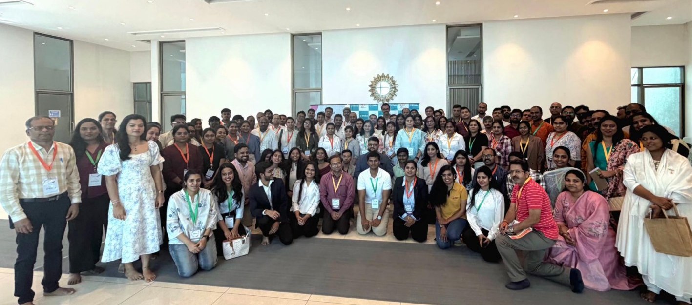 The full cohort together in the room after a session.